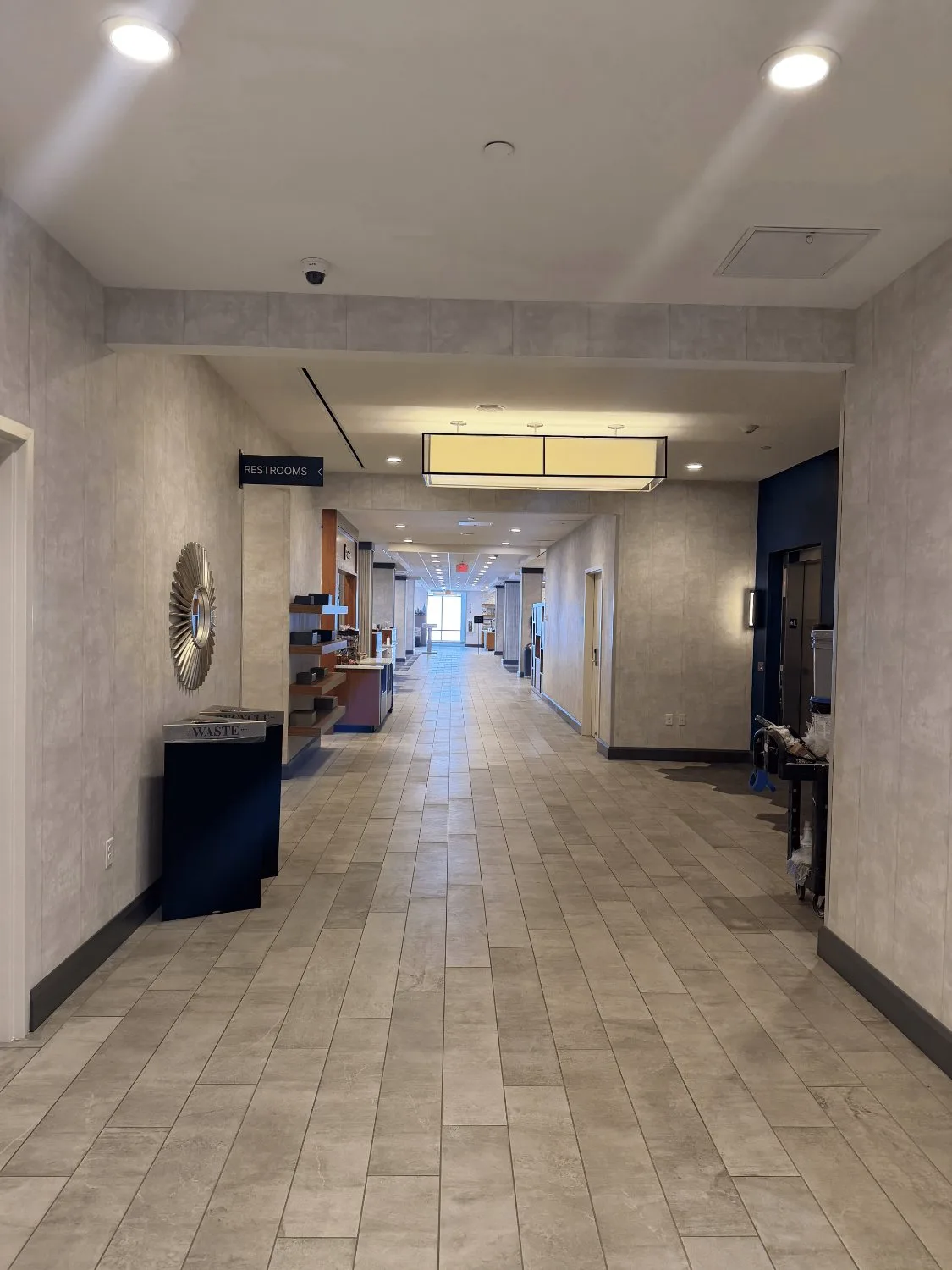 Polished stone corridor in a New York commercial property, cleaned by Excellent Choice